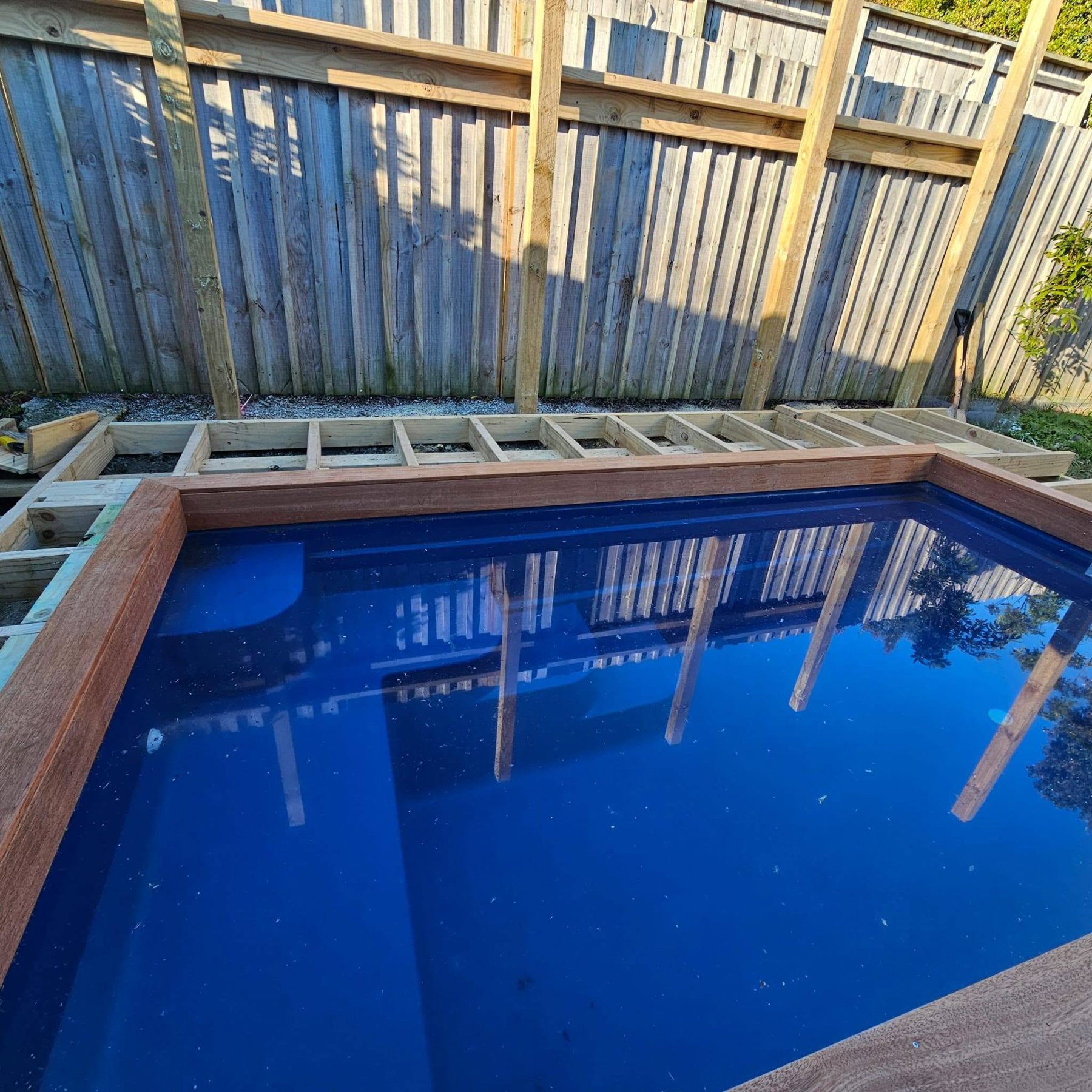 Timber joists framed around the pool shell