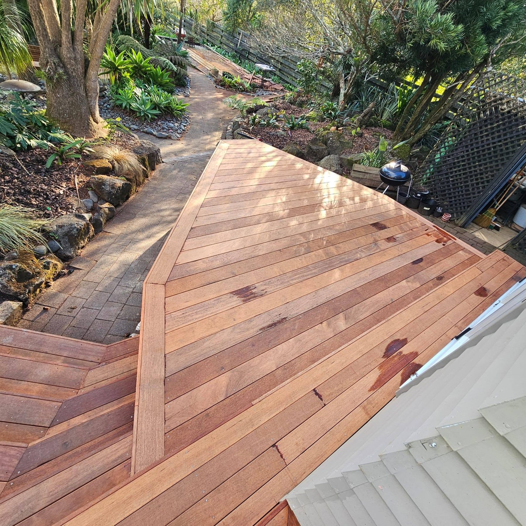 Kwila walkway threading through the garden
